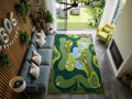 Shubham-Art-Rugs-hand-tufted-new-zealand-wool-golf-course-rug-novelty-sports-area-decor A rectangular area rug with a golf course landscape design in shades of green, blue, and beige, shown in a modern living room setting.