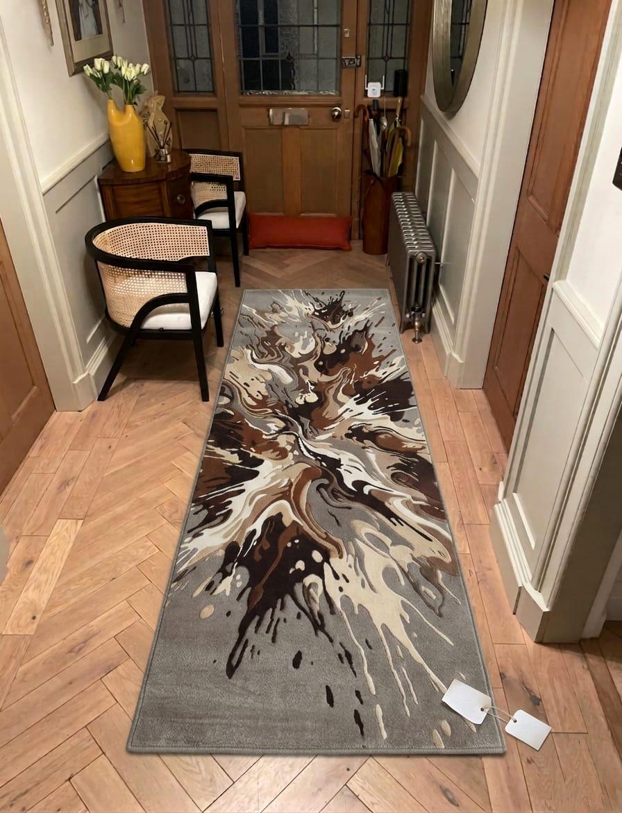 Shubham-Art-Rugs-hand-tufted-wool-rug-abstract-splash-design-contemporary-living-room-carpet A long runner rug with an abstract tree-bark style pattern in brown, beige, and gray, shown on a light wood herringbone floor in a hallway.