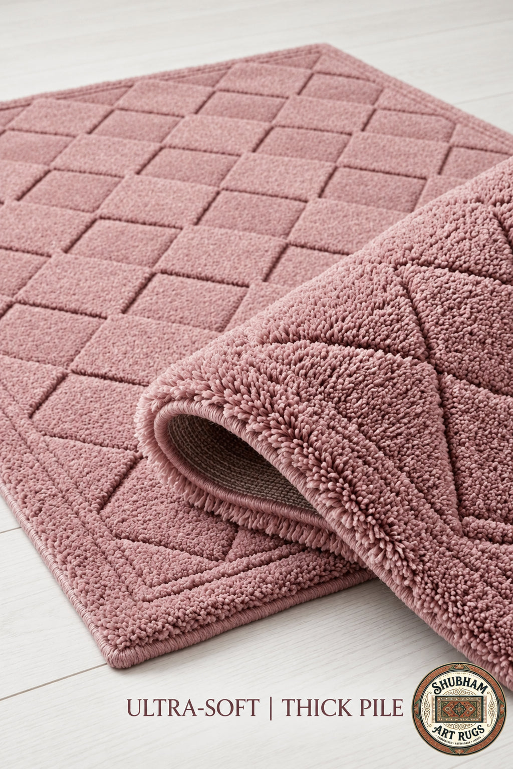 Detailed-3d-hand-carved-high-low-pile-texture-pink-geometric-diamond-lattice-wool-rug Pink textured rug on a light wooden floor with 'Shubhan Art Rugs' branding.